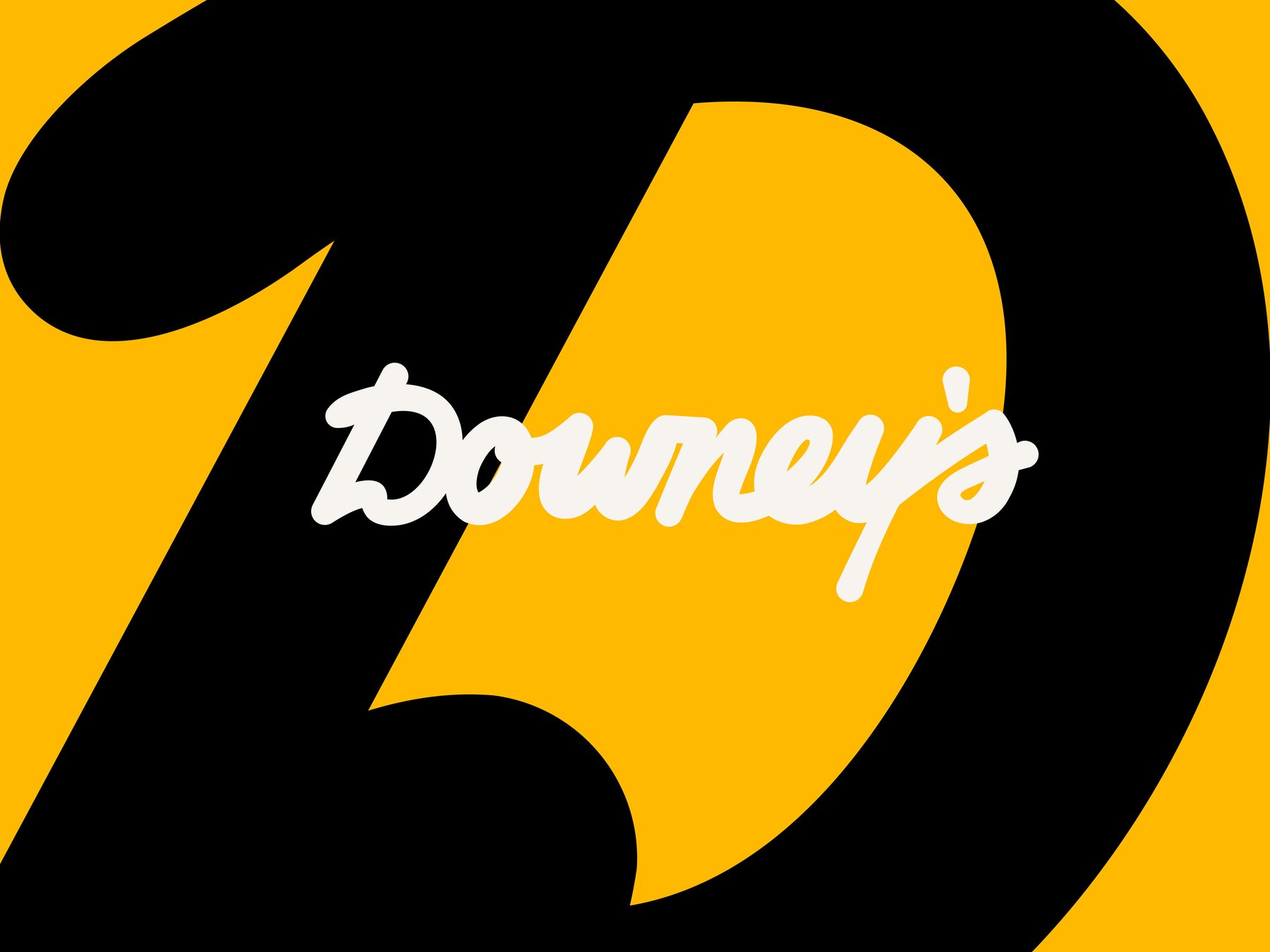 The Downey's script wordmark over a giant black-and-honey D monogram