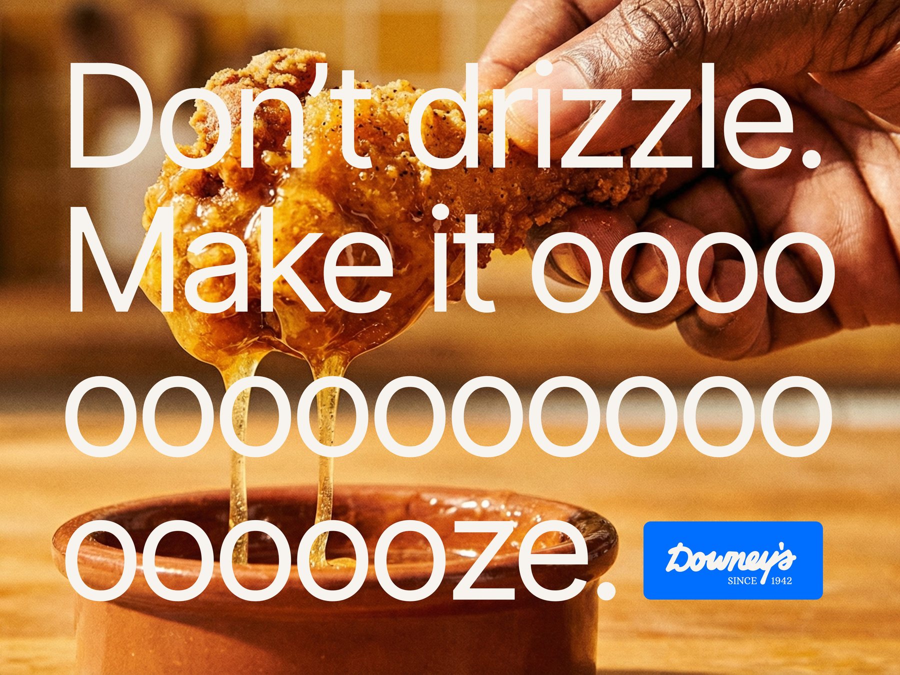 Campaign ad: fried chicken dripping honey butter — Don't drizzle. Make it ooooooze.