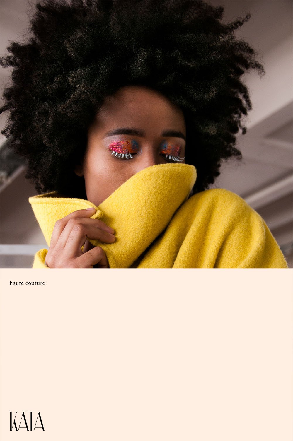 KATA cover — model hiding behind a yellow collar, 'haute couture' caption, KATA mark signing the cream band