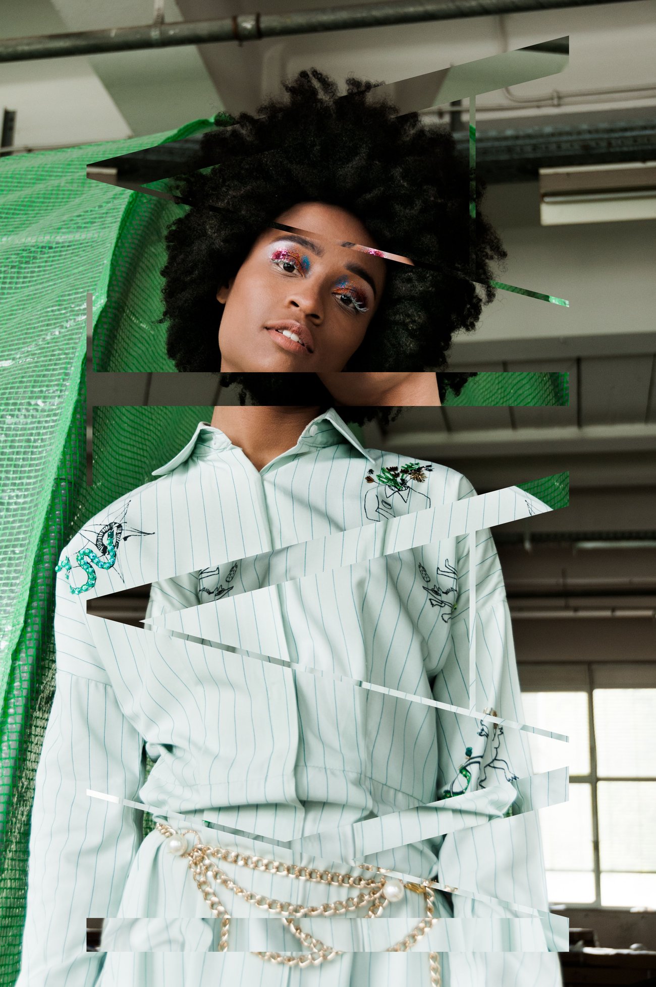 Editorial photo cut into horizontal strips set out of register — model in a mint pinstripe shirt with pearl chains