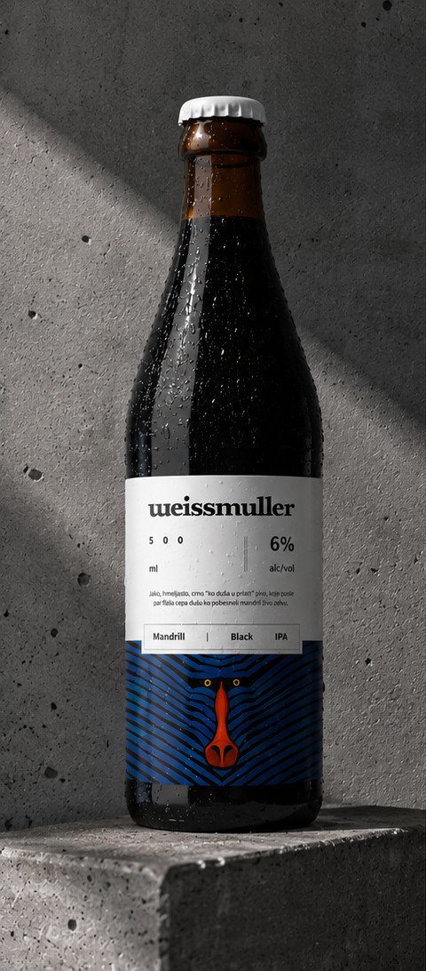 Weissmuller Mandrill bottle photographed against raw concrete, dressed in condensation, lit from the left